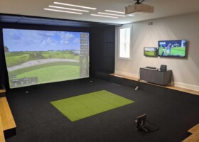 Custom TrackMan simulator with black putting green - Massachusetts Custom TrackMan simulator with black putting green - Massachusetts