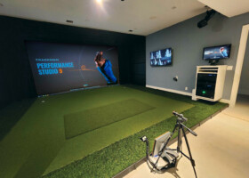 TrackMan studio featuring our custom cabinet and putting green with floor box - New York TrackMan studio featuring our custom cabinet and putting green with floor box - New York