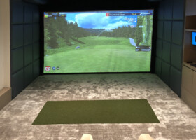 Foresight GCHawk simulator/movie room with golf screen rolled down - New York Foresight GCHawk simulator/movie room with golf screen rolled down - New York