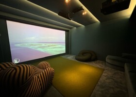 Penthouse living at its finest. Room features a roll down golf screen, theater screen, multisport play, surround sound and one-touch automation - Florida