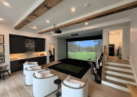 Home addition features Uneekor EYE XO, video analysis, and complete home theater - Massachusetts