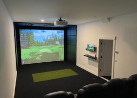 Designed for a new home, this custom golf sim and movie theater will be perfect for improving the swing or watching the latest movies. - Vermont